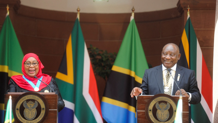 Tanzanian President Samia Suluhu Hassan and President Cyril Ramaphosa address a joint news conference during a state visit at the Union Buildings in Pretoria on Thursday.