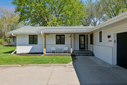 Modern white house with porch in this luxury house for sale in Edina ($675,000)