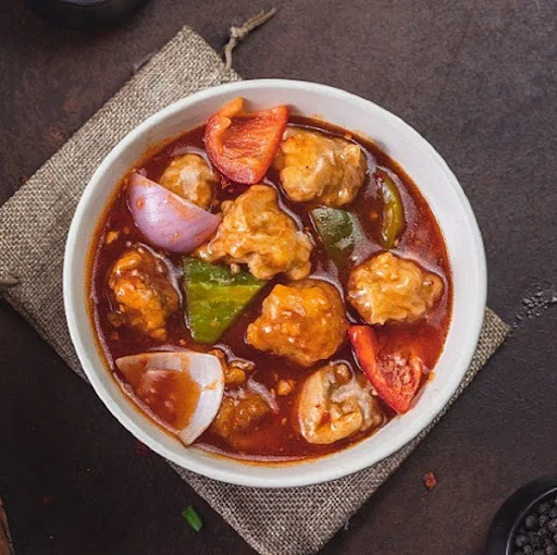 Chilli Garlic Chicken In Red Bell Pepper (12 Pcs)