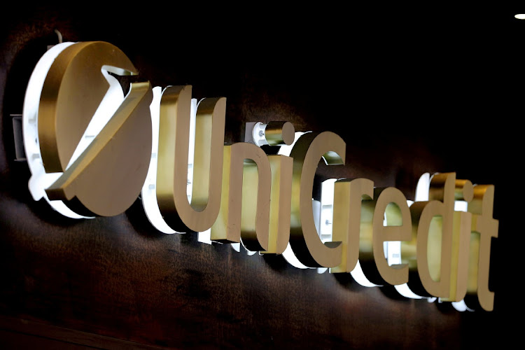 The UniCredit bank logo in the old city centre of Siena, Italy. Picture: STEFANO RELLANDINI