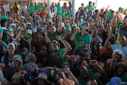 Some of the mineworkers of Gold One Modder East operations in Springs in a meeting to forge a way forward on the strike action after emerging from underground two weeks ago.