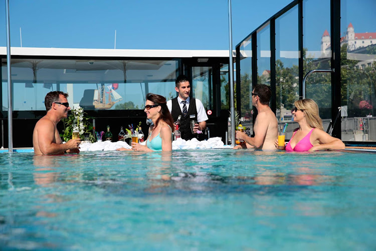 Enjoy one of the few swim-up bars on a river cruise ship aboard AmaViola.  