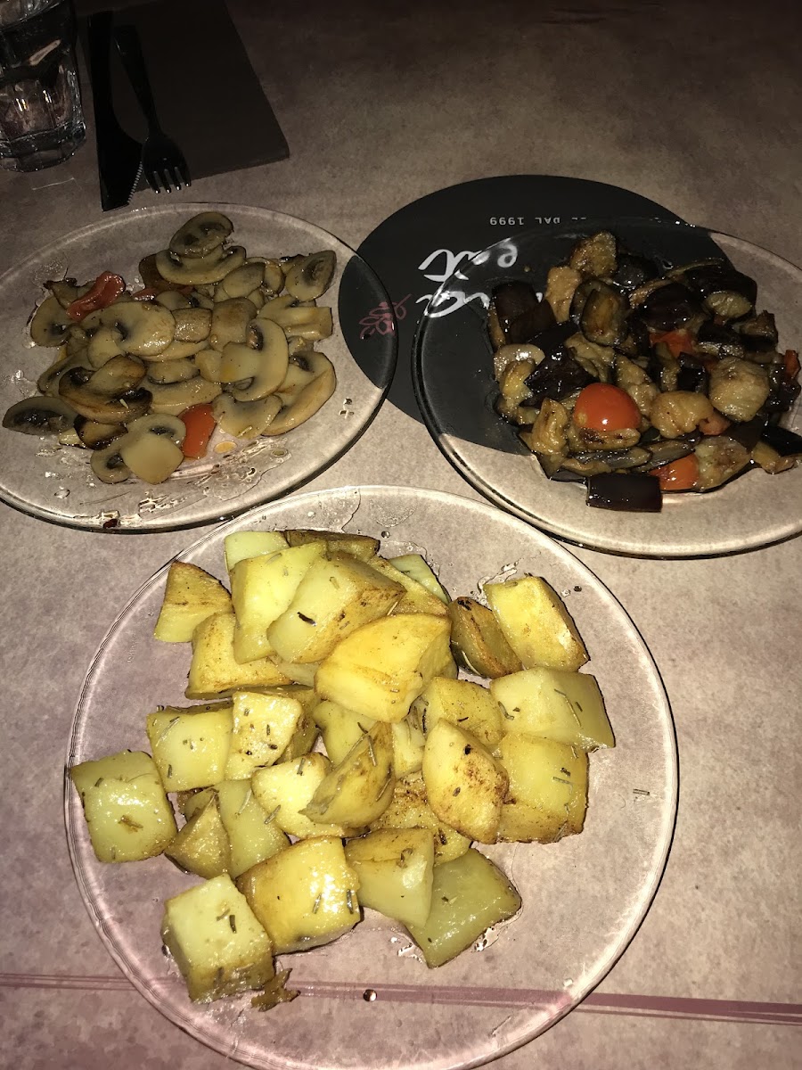 Yummy side dishes. 
Mushrooms, eggplant (best 1), & roasted potatoes.