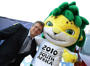 Mascot Zakumi with FIFA Secretary General, Jerome Valcke outside the CTICC on December 2, 2009 in Cape Town. 