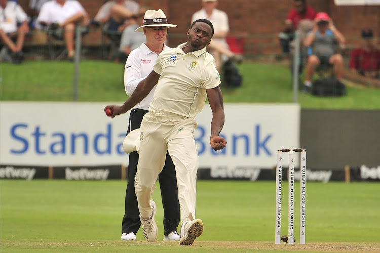 Kagiso Rabada of the Proteas runs in past umpire Bruce Oxenford on day two of the third Test between South Africa and England at St George's Park in Port Elizabeth on January 17 2020.