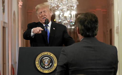 US president Donald Trump accuses CNN's Jim Acosta of peddling 'fake news' during a news conference following Tuesday's midterm congressional elections in the US.