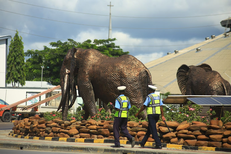 Police officers on patrol at the beautified Makupa roundabout on Wednesday.