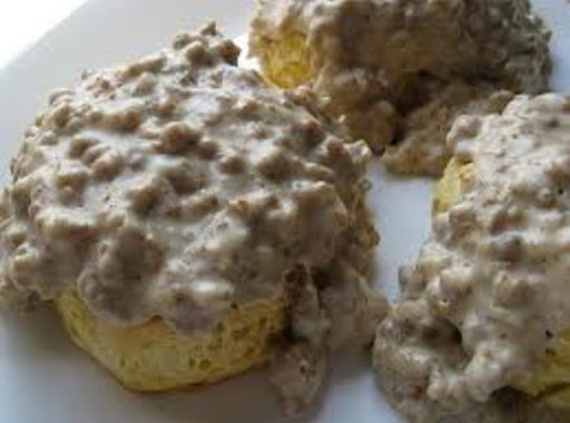 Sausage gravy over biscuits