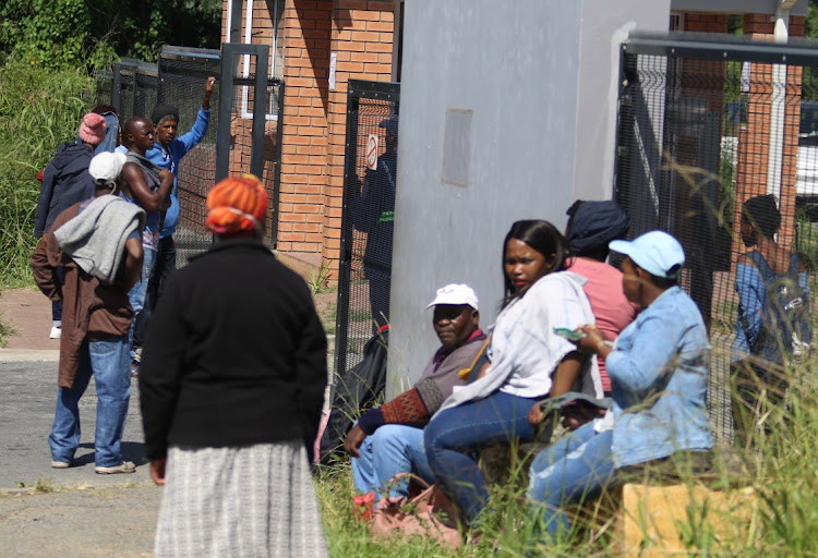Patients waiting outside Duncan Village Day Hospital.