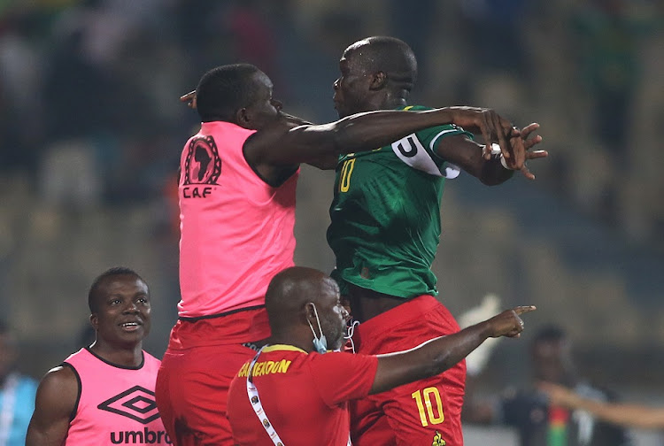 Vincent Aboubakar of Cameroon is congratulated for scoring the equaliser during the 2021 Africa Cup of Nations third-Place playoff against Burkina Faso at Ahmadou Ahidjo Stadium in Yaounde, Cameroon February 5 2022.
