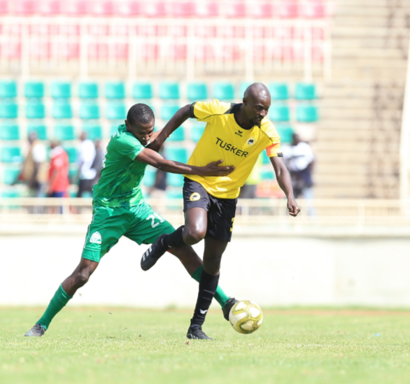 Gor Mahia's Sydney Ochieng (L) challenges Humphrey Mieno of Tusker in a past match