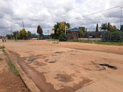 The streets in the area are also riddled with potholes.