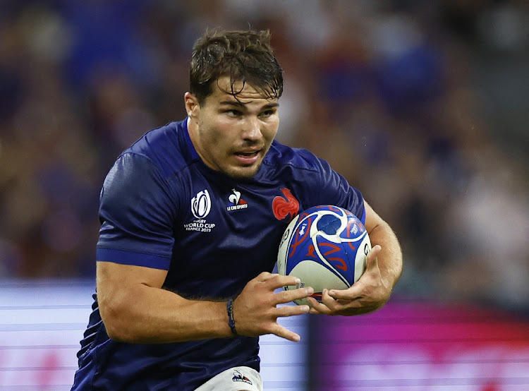 France’s Antoine Dupont runs through to score their seventh try in their Rugby World Cup pool A win against Namibia at Stade Velodrome in Marseille on September 21. Picture: REUTERS/ PETER CZIBORRA