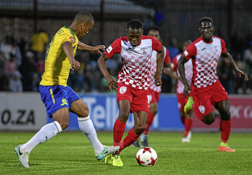 THE BALL IS MINE: Relebogile Mokhuoane of Free State Stars tries to sell Wayne Arendse of Mamelodi Sundowns a dummy during the teams' Absa Premiership match at Goble Park, Bethlehem, on Monday night. Sundowns won the match 2-1.