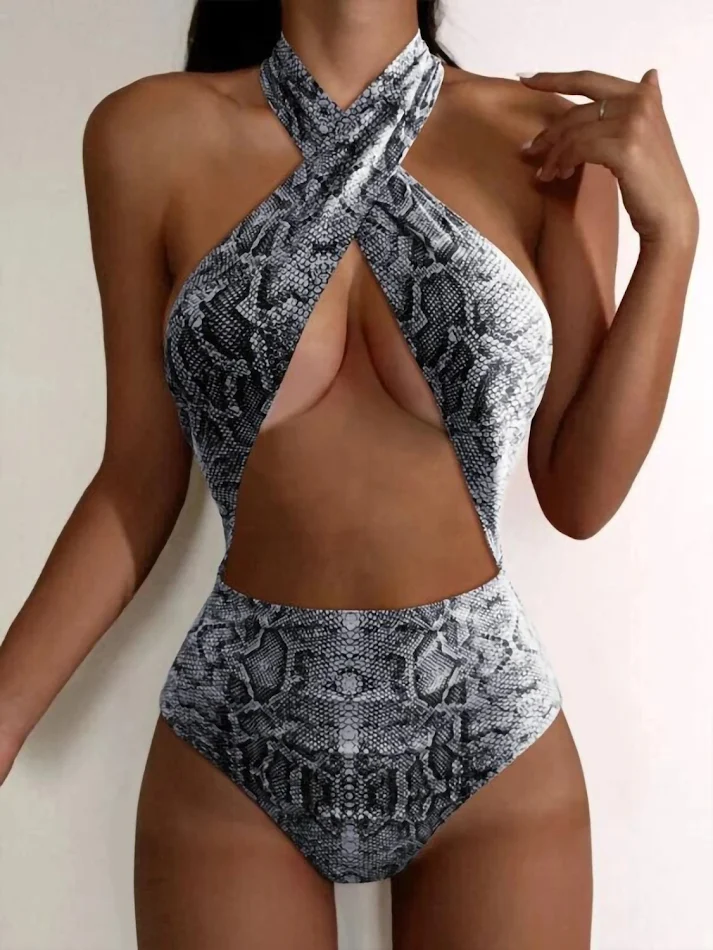 Bikini triangular de mujer con estampado de serpiente para un look atrevido. Disfruta del sol con estilo y comodidad en la playa o piscina.