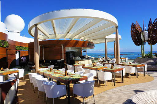 The Rooftop Garden Grill is an al fresco restaurant serving lunch and dinner featuring upscale barbecue favorites.