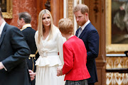 Ivanka Trump and Britain's Prince Harry, the duke of Sussex, review items from the Royal Collection at Buckingham Palace in London, Britain, on June 3 2019. 