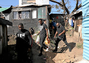 Duduzane Zuma  delivers  food parcels to  a child-headed household  in Quarry Heights, KwaZulu-Natal.