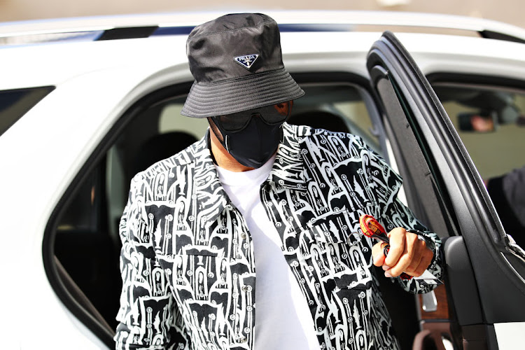 Lewis Hamilton of Great Britain and Mercedes GP arrives at the circuit before practice ahead of the F1 Grand Prix of Abu Dhabi at Yas Marina Circuit on December 11, 2020 in Abu Dhabi, United Arab Emirates.