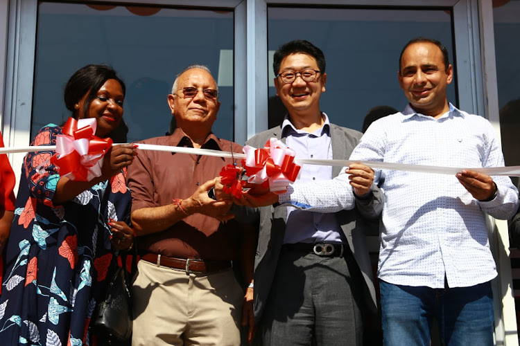 Former Mombasa deputy governor Hazel Katana, R. M Lakhani, LG Electronics director Janghoon Chung and Rakesh Singh during the Grand Opening of the LG Brand shop in Mombasa on September 12. / JOHN CHESOLI