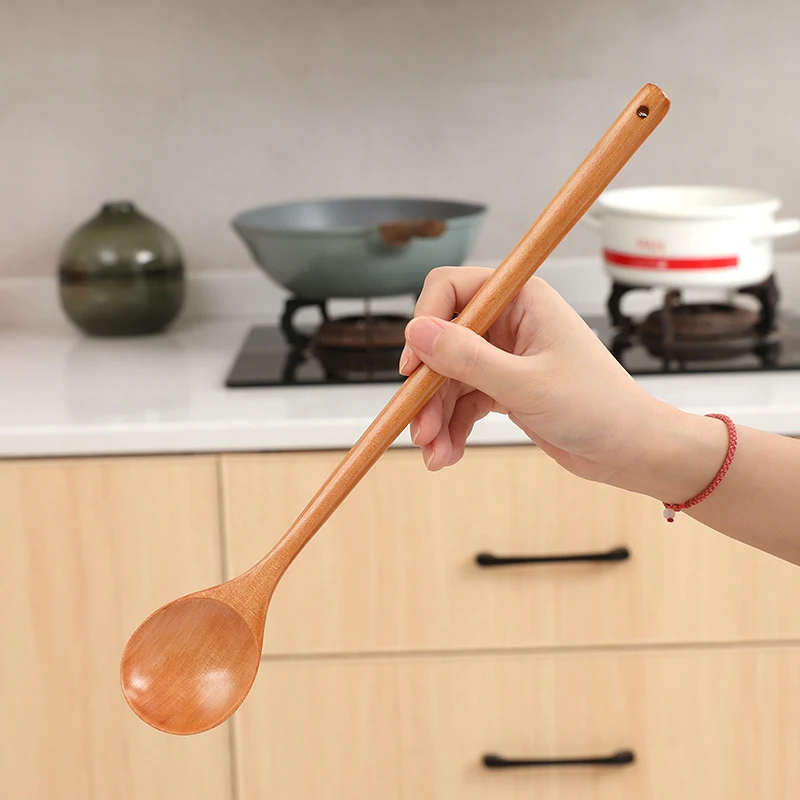 Extended Handle Cooking Spoon for easy stirring in deep pots and pans. Provides comfort and reach, helping prevent spill
