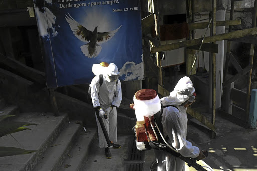 A team of workers disinfect the Babilonia slum in Rio de Janeiro, Brazil, last Sunday as the country recorded 659 Covid-19 deaths in 24 hours, reaching a total of 72,151 deaths (76,822 this week). Populist leaders such as Brazil’s President Jair Bolsonaro and Donald Trump in the US have have been found wanting when confronted by the real life-anddeath challenges of the pandemic.