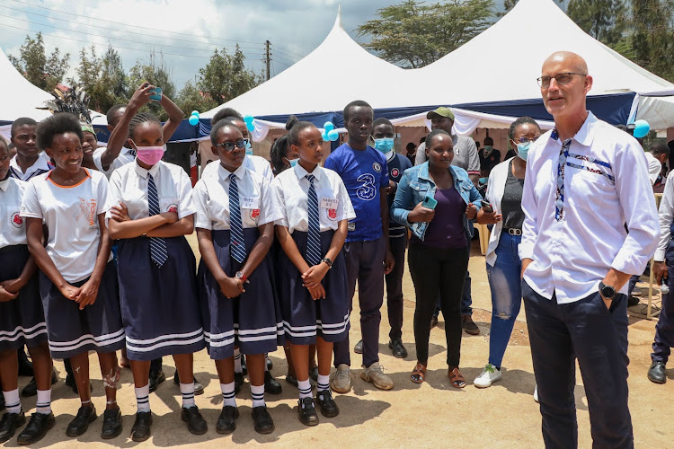 Po Hansen interacts with some of the students during the celebrations