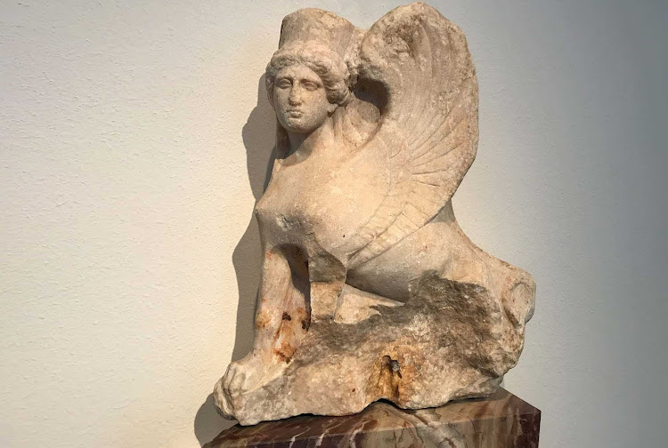   Sphinx-shaped finial of a Funerary Stele dates to 400-410 B.C. at the Altes Museum in Berlin. The winged lions with a human head were adopted by the Greeks from the Near East in the seventh century B.C. 