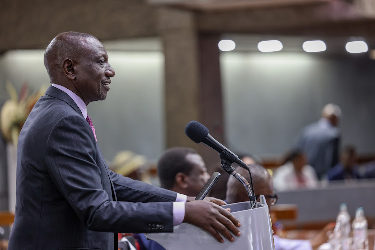 President William Ruto speak at the Kenyatta International Convention Centre during the inaugural Kenya Diaspora Investment Conference on December 13, 2023.