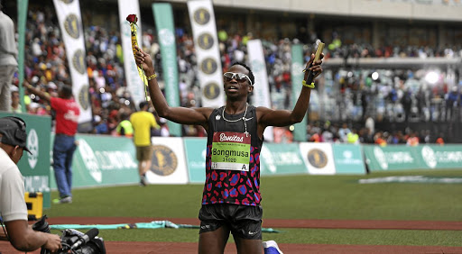 Bongmusa Mthembu celebrates winning the Comrades Marathon last year.