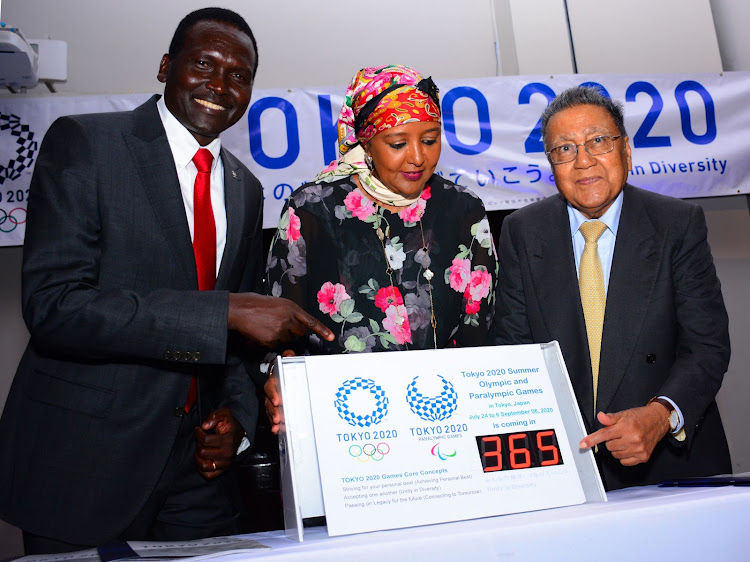 NOCK president Paul Tergat, Sports CS Amina Mohammed and Businessman Manu Chandaria during the 2020 Tokyo Olympic launch in a Nairobi hotel