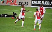 Yannick Zakri of Ajax Cape Town celebrates goal with teammates Grant Margeman (c) and Tendai Ndoro of (r) during the Absa Premiership 2017/18 football match against Orlando Pirates at Cape Town Stadium, Cape Town on 31 January 2018.