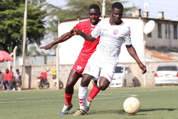 FC Talanta's Alfred Chole races past Administration Police's Gideon Were in past match.