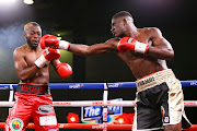 Luvuyo Sizani laboures against Jackson Masamba but in the end retained his ABU SADC light heavyweight belt on points.