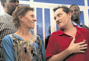 RELIEVED:  South African hostages Bruno Pelizzari  and Debbie Calitz  after their release in Somalia's capital Mogadishu yesterday. They were kidnapped by Somali pirates in the Indian Ocean 20 months ago.   photo: Reuters