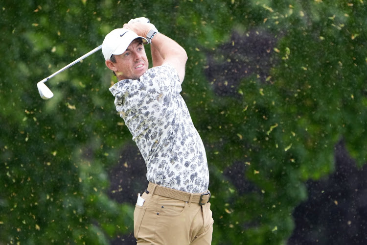 Rory McIlroy plays his shot from the fifth tee during the first round of the US Open golf tournament.