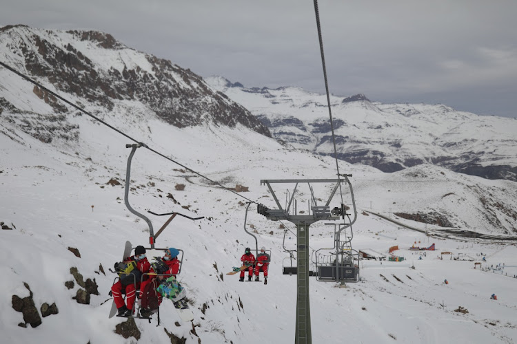 Tourists are pictured at a mountain resort as Chile's health authority lifts closure restrictions at Farellones Park in Santiago, Chile, July 1, 2021.