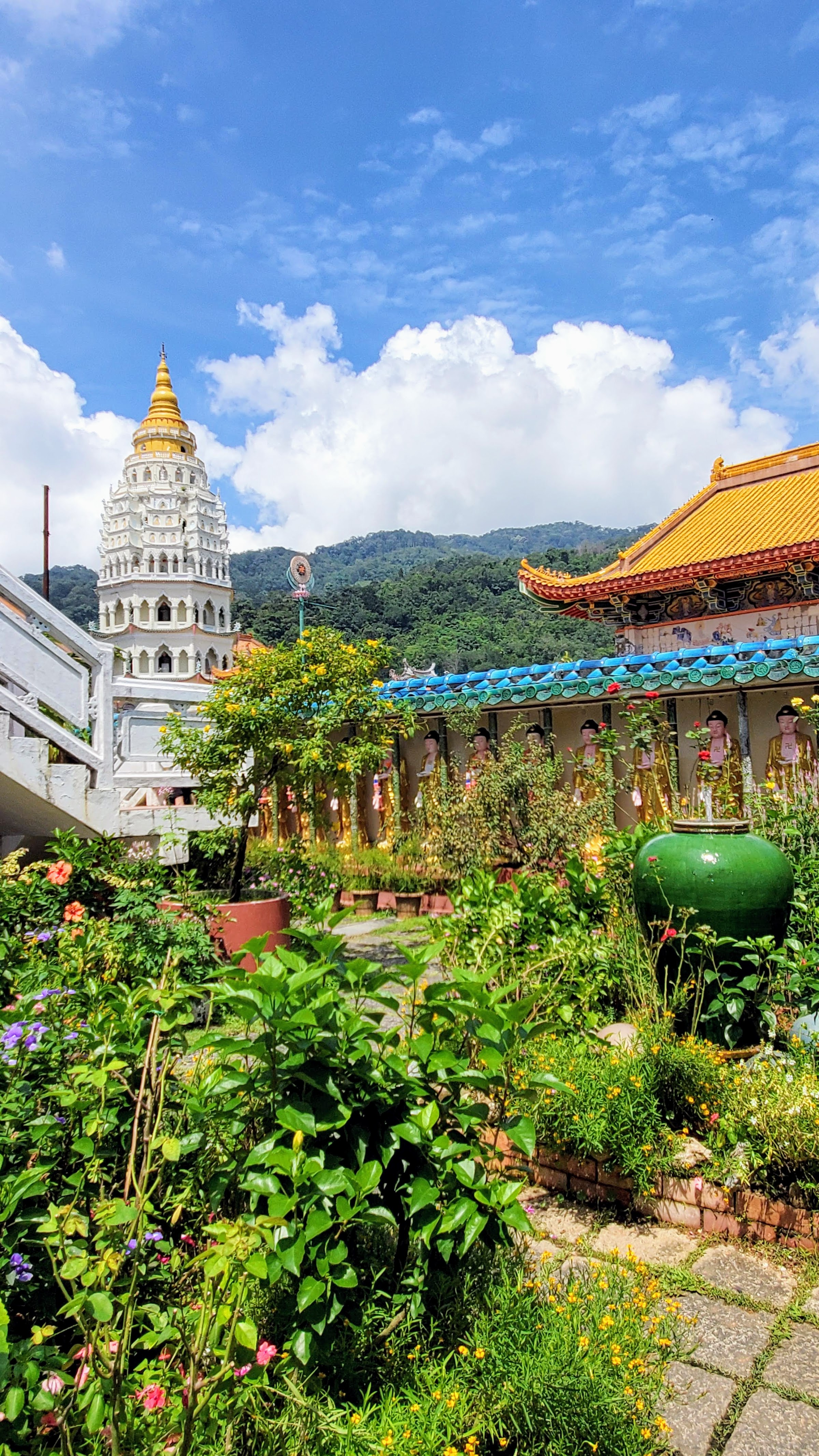 Visiting Kek Lok Si: What makes it unique is that among its millions of Buddhas it shows the blending of cultures that is so representative of Malaysia by including many stylistic representations of Buddha.