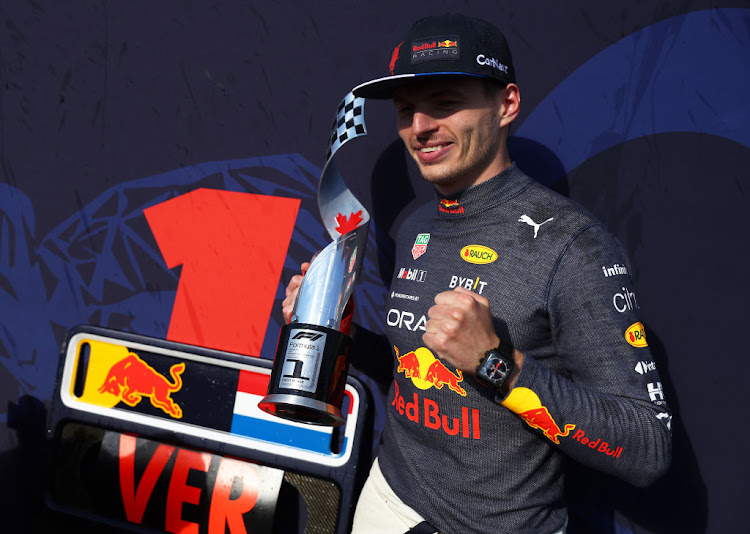 Race winner Max Verstappen celebrates with his trophy after the F1 Grand Prix of Canada at Circuit Gilles Villeneuve on June 19 2022 in Montreal, Quebec.