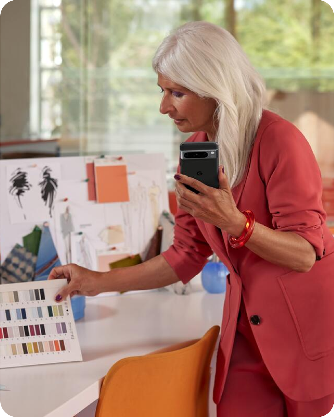 Woman working in her studio on her Pixel phone.