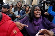 Tova Noel (C) is surrounded by fellow guards as she departs after a court hearing regarding her actions the evening that led to the death of Jeffrey Epstein, outside a federal court in New York City, US, November 25, 2019.  