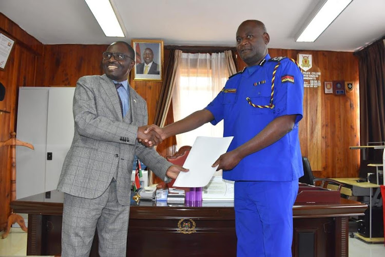 Kenya Coast Guard Service Director Bruno Shioso hands over to National Police College-Main Campus Commandant Munga Nyale