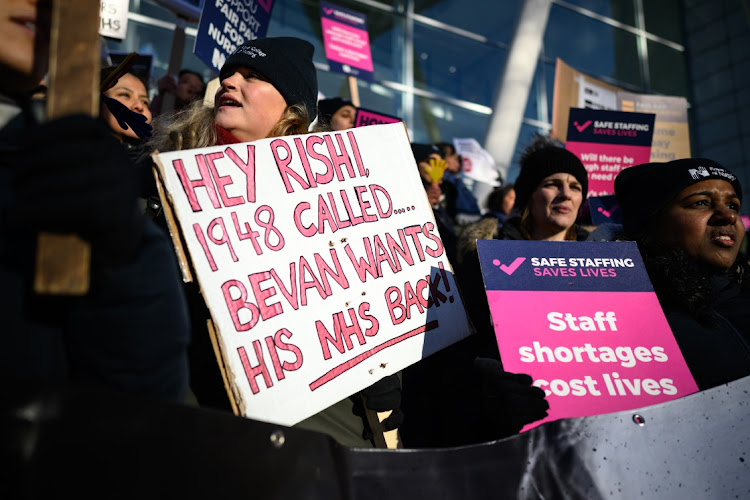 Nursing staff and supporters chant and wave placards as they protest outside University College Hospital during a day of strikes on January 18 2023 in London. Picture: LEON NEAL/GETTY IMAGES