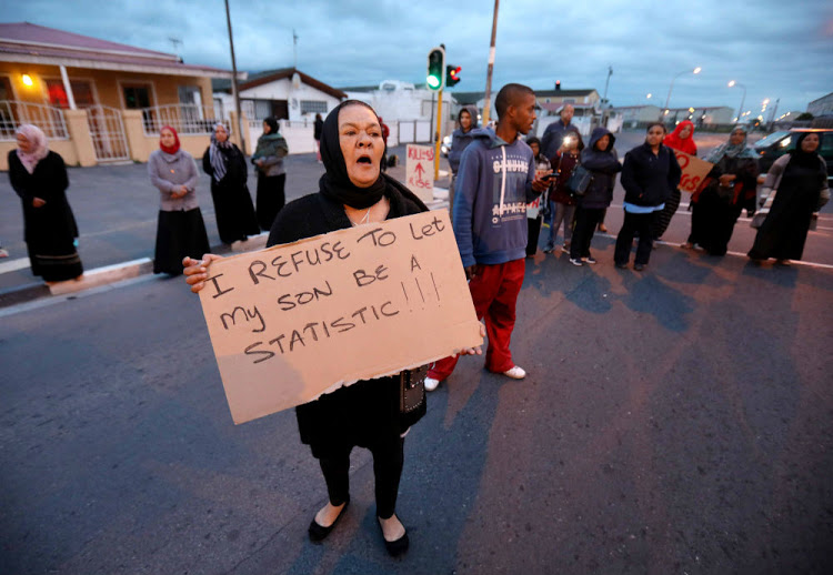 NUMBERS GAME Angry residents take part in the Total Shutdown protest.