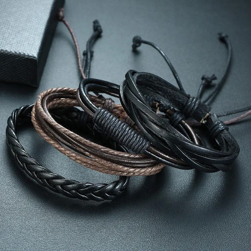 Heren PU lederen gevlochten armband set (vierdelig),verstelbaar. Stijlvolle en comfortabele armbanden voor elke gelegenheid.