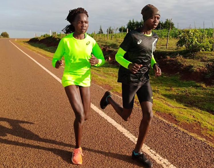 Antonina Kwambai training alongside Silas Kiplagat in Iten, Elgeyo Marakwet County