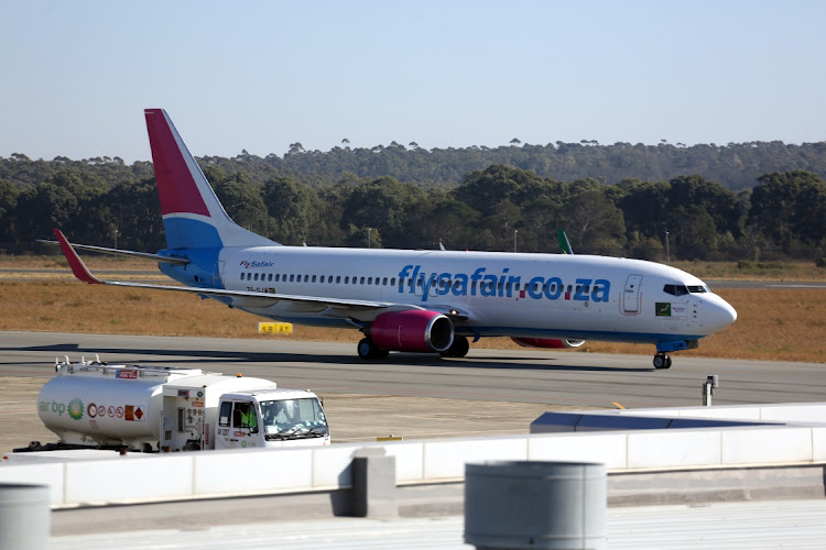 A FlySafair flight lands at East London airport. File photo.