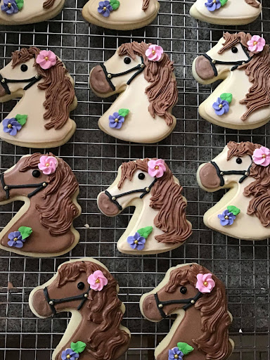 The Land O Lakes Sugar Cookie recipe is hands-down the best!  I made these horses for a birthday party, and decorated using royal icing.