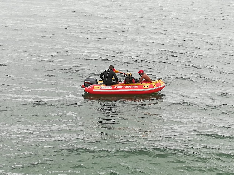 Police and paramedics responded to reports of a body floating in the surf at Durban's Bay of Plenty