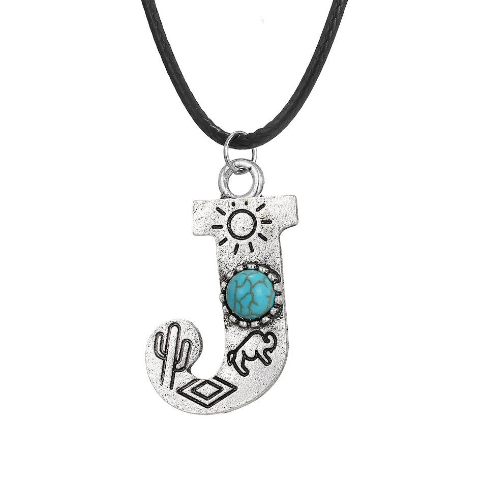 Turquoise Totem Letterketting Vintage Een uniek sieraad. Personaliseer je look met deze vintage letterketting, perfect om je eigen stijl te laten zien en op te vallen.